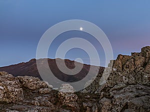 Montseny mountain under rising moon photo
