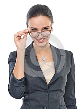 Rising star in the office. Studio portrait of a confident young female office worker isolated on white.