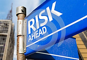 Risk Ahead blue road sign