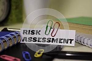 Risk Assessment on the paper isolated on it desk. Business and inspiration concept