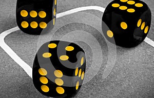 risk concept - playing dice on a green gaming table. Playing a game with dice. Red casino dice rolls. Rolling the dice concept for