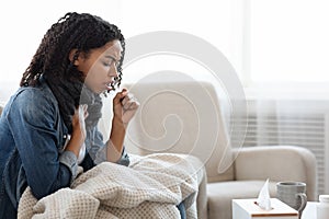 Risk Of Coronavirus. Sick Black Woman Coughing Hard At Home