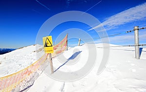 Risk of falling! The Nebelhorn Mountain in winter. Alps, Germany.