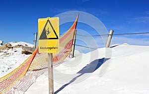 Risk of falling! The Nebelhorn Mountain in winter. Alps, Germany.