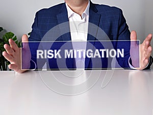 RISK MITIGATION text in futuristic screen