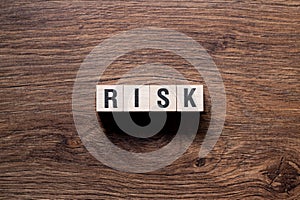 Risk - word concept on building blocks, text