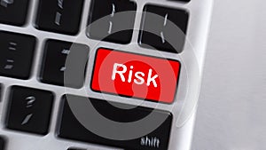 Risk word on red computer keyboard button
