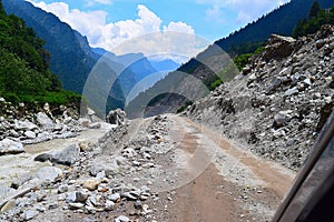 The risky Jshimath-Badrinath highway, Uttarakhand, India photo