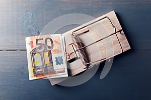 Risky money - euro bill in mouse trap