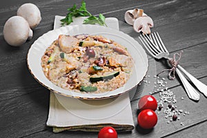 Risotto with chicken meat and mushrooms