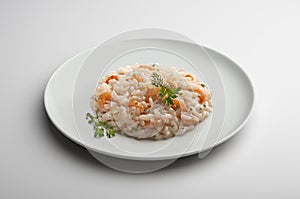 Risotto dish with shrimp and aromatic herbs