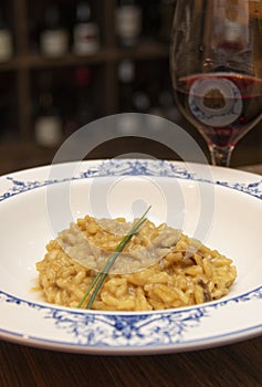 Risotto of funghi porcini with glass of wine
