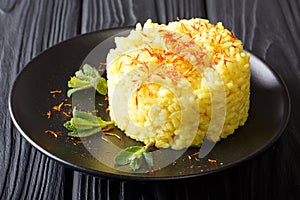 Risotto milanese, an italian recipe typical of Milan closeup. Ho