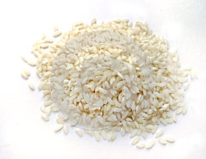 Risotto rice on white