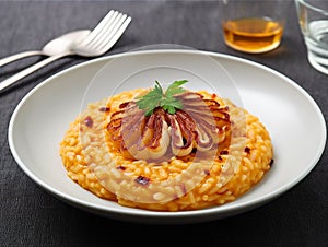 Risotto safran gamberi served on white plate 1695524232996 3