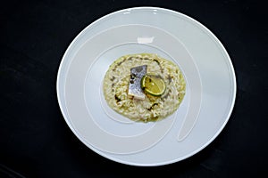 Risotto with sea bass,  italian food. Sea bass fillet, risotto