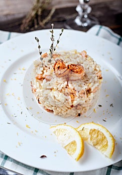 Risotto with shrimp and glass of white wine