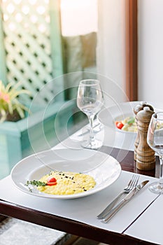 Risotto on a table at traditional italian restaurant.