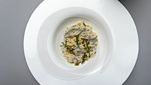 risotto with wild asparagus ,asparagus acutifolius, on italian plate