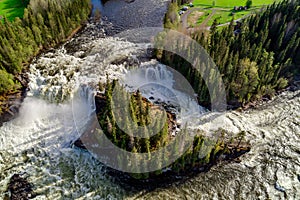 Ristafallet waterfall in the western part of Jamtland is listed as one of the most beautiful waterfalls in Sweden photo