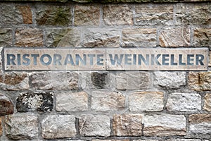 Ristorante wine cellar written on stone