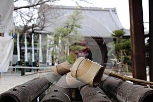 A ritual to purify the pilgrim. In Japanese, it`s called