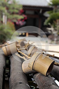 A ritual to purify the pilgrim. In Japanese, it`s called