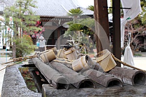 A ritual to purify the pilgrim. In Japanese, it`s called