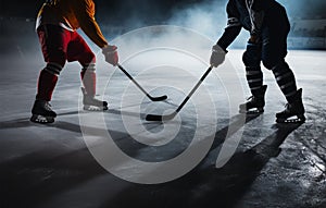 Rival hockey players stand side by side, clutching their sticks