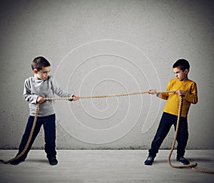 Rivalry of two brothers with a rope