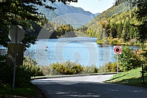 River across the forest in Jacques-Cartier National Park, Canada on a sunny day