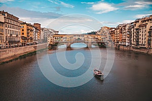 River Arno with Ponte Vecchio in Florence, Italy photo
