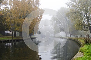 River during Autumn in Cambridge during fog