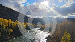 river autumn mountains the sun water span copter