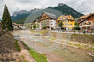 River Avisio in the historic center of Moena, the fairy of the Dolomites