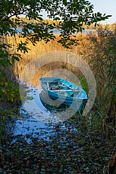 By the river bank from a wooden boat