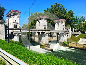 River barrier on Ljubljanica river by architect Plecnik for maintaining the water level in the city center