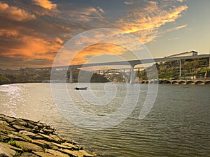 River beach of Areinho on the bank of Gaia on the Douro river at sunset. Portugal photo