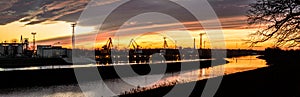 The river bed in the coal unloading zone at the thermal power plant, sunset