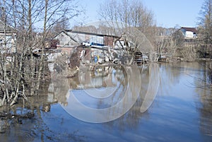 The river begins to flood in the spring, flooding the banks.