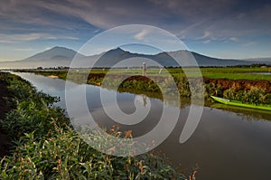 River and the boat with mountain background