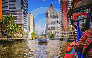 River boat transporting passengers and tourist down Chao Praya river photo