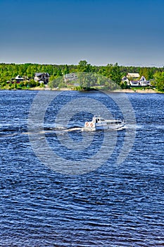 The river boat transports people to the other side