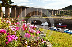 River boats low tide bridge england