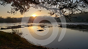 River in brazil sun rises photo