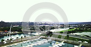 River, bridge and aerial of city and buildings, architecture and urban design for background. Cinematic, drone view and