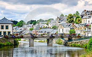 River, bridge and colourful ancient houses. Josselin, beautiful village of French Brittany