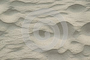 River building sand patterns from the wind, natural background.