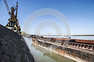 River bulk barge and cranes