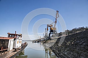 River bulk barge and cranes
